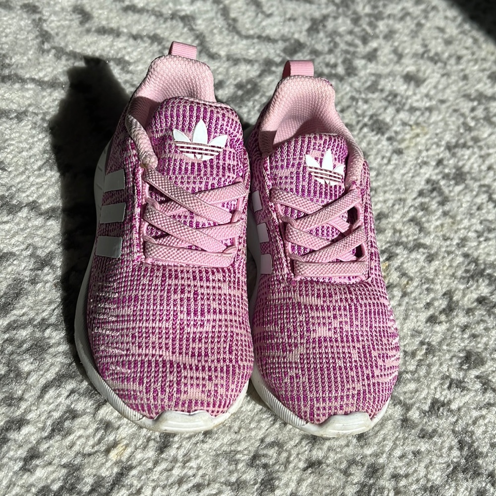 Toddler girls pink and white adidas sneakers. Lightly worn in great condition.